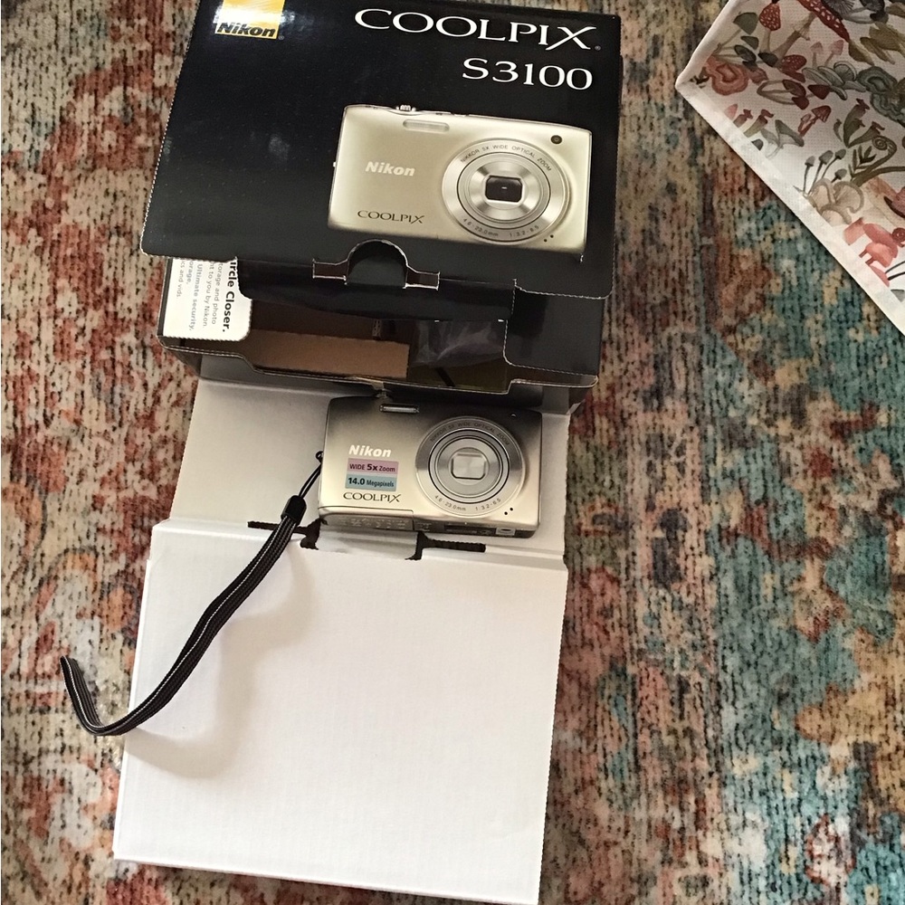 Older Nikon COOLPIX S3100 Silver Digital Camera